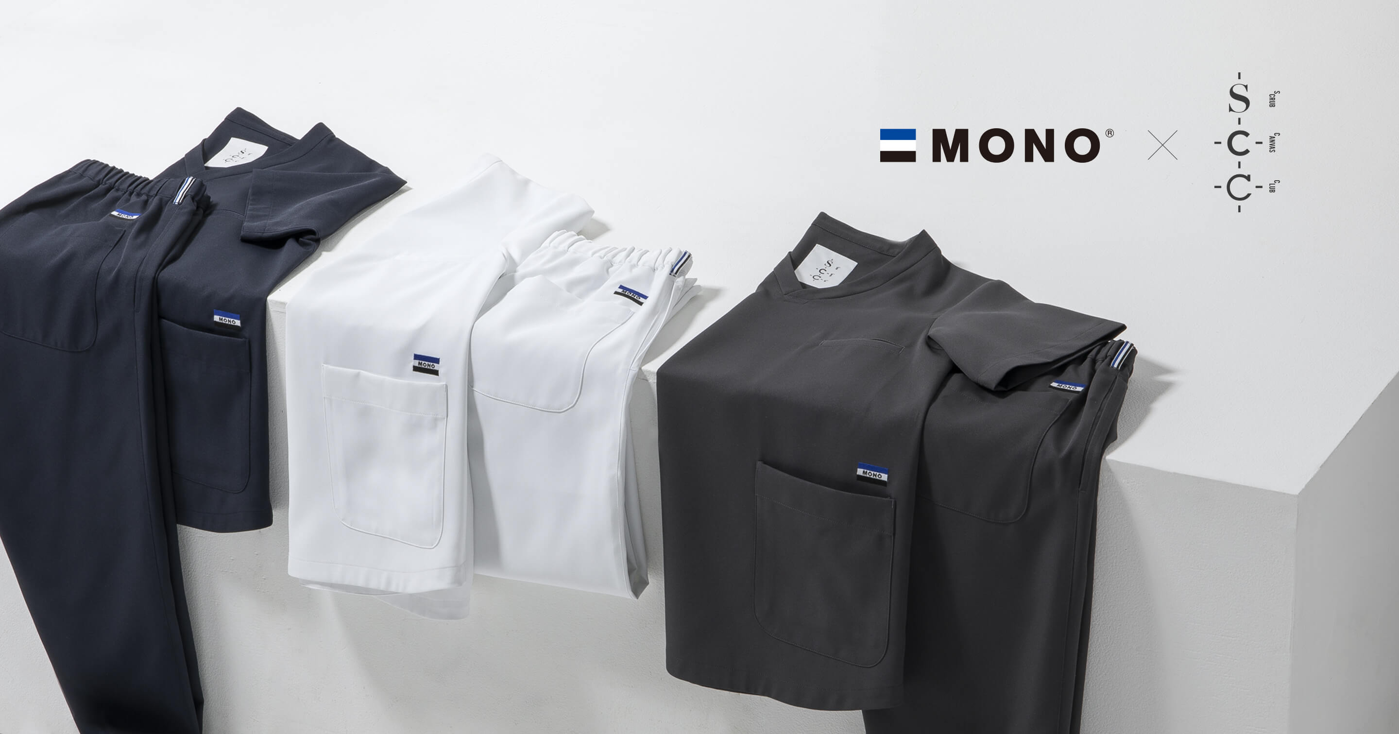トンボ鉛筆「MONO」と医療ウェアブランド「クラシコ」がコラボレーションしたスクラブ白衣(ディープネイビー・白・グレー)